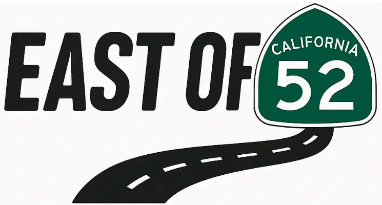 East of 52 logo featuring a winding black road leading into a green California state highway sign with the number 52, accompanied by bold black text reading 'East Of' to the left.